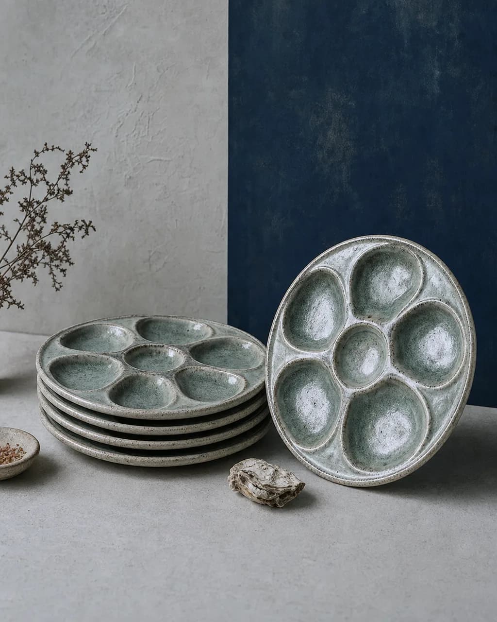 Stoneware Oyster Plates, Set of 4. Reactive-glaze stoneware, six wells, no two alike.